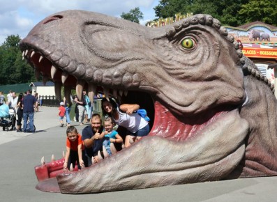 A giant dinosaur head designed as a photo pod